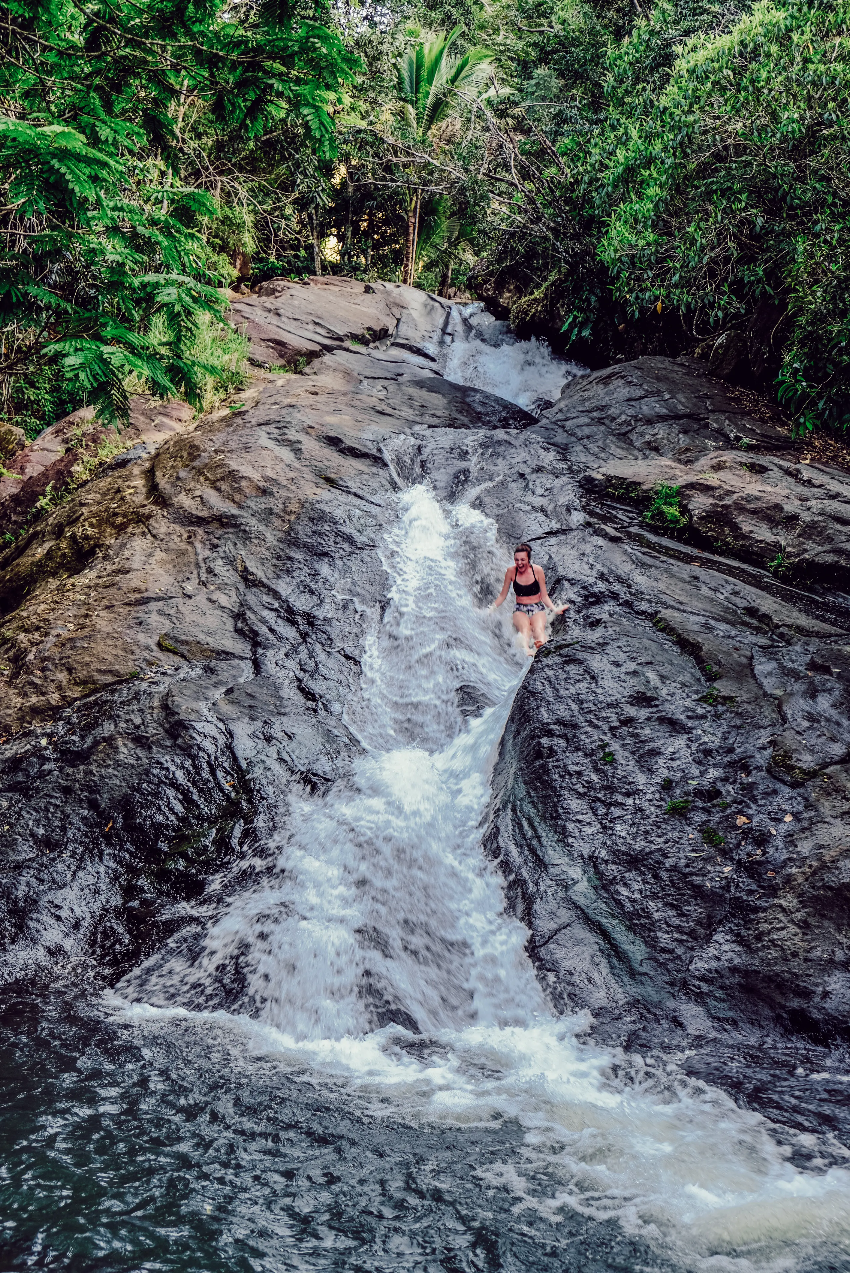 natural waterslide in the Puerto Rico rainforest